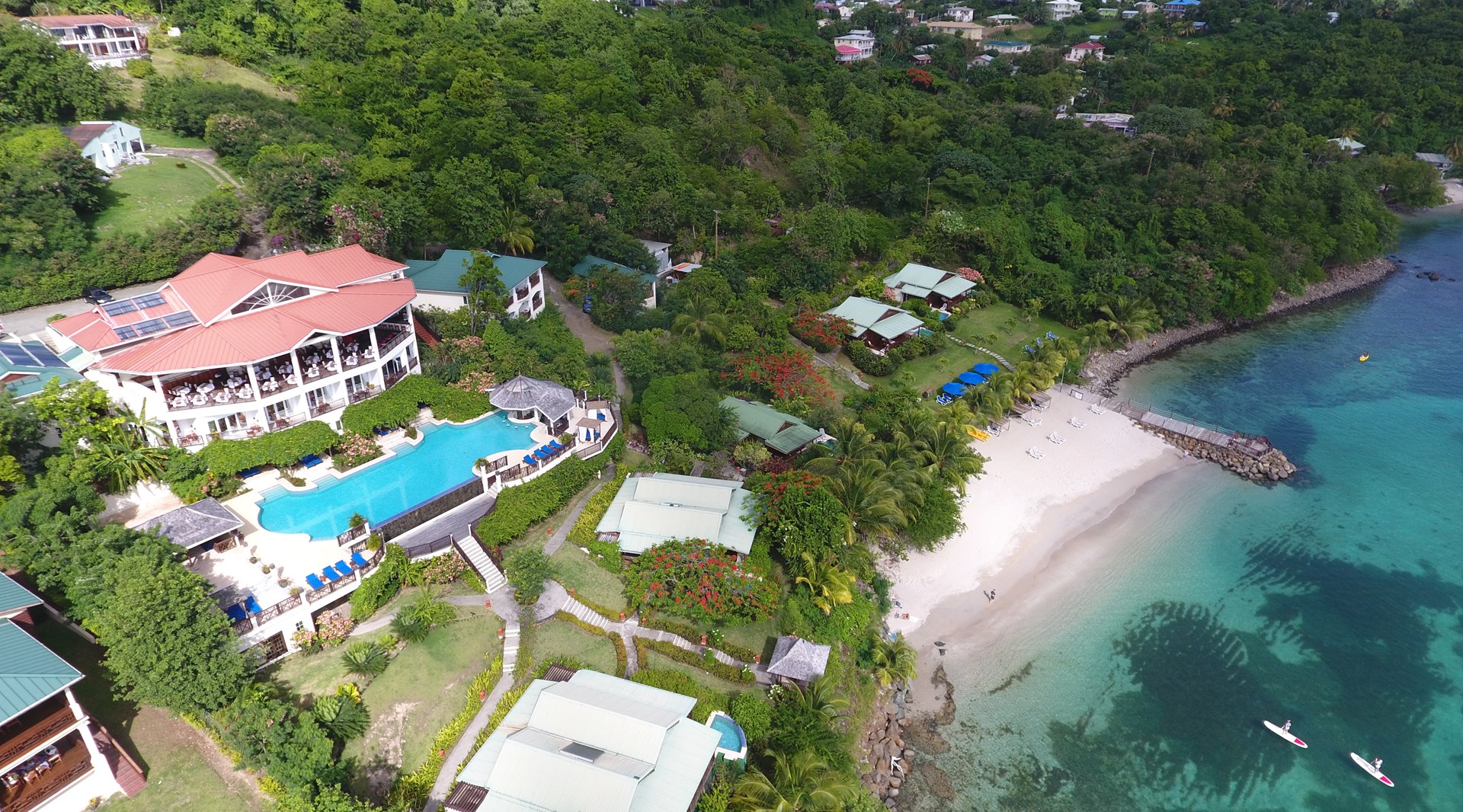 Waar elk huisje een adembenemend uitzicht heeft over de Caribische zee Calabash Cove Resort & Spa